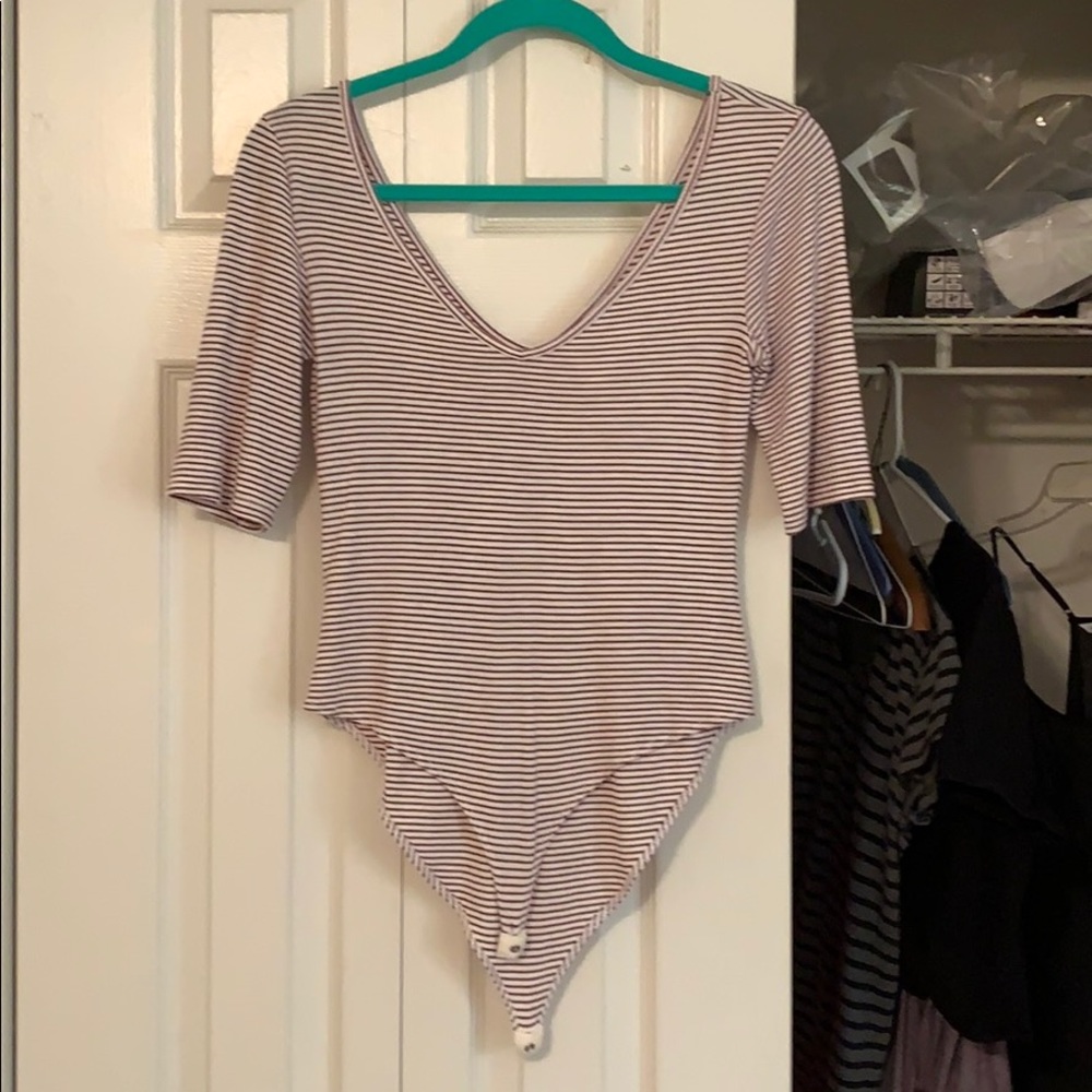Edgy striped body suit